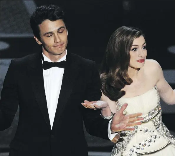  ?? GABRIEL BOUYS/GETTY IMAGES ?? Actors James Franco, left, and Anne Hathaway were roasted after hosting the Oscars together in 2011.