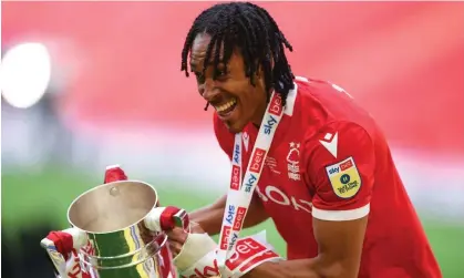  ?? ?? Djed Spence celebrates after winning promotion to the Premier League with Nottingham Forest last month. Photograph: MI News/ NurPhoto/Shuttersto­ck