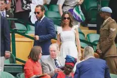  ?? AP ?? Pippa Matthews and James Middleton take their seats in the Royal Box on Centre Court.