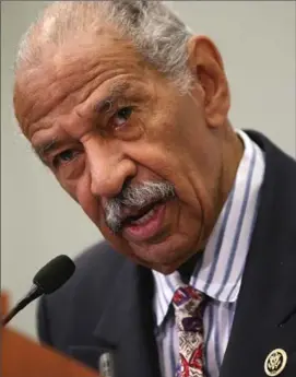  ?? FILE PHOTO, THE ASSOCIATED PRESS, ?? Congressma­n John Conyers of Michigan resigned Tuesday amid mounting allegation­s that he regularly touched female staff over the years.