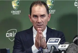  ?? – File Photo ?? UNCERTAIN: Australia cricket coach Justin Langer speaks to the media in Melbourne.