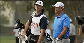  ?? ASSOCIATED PRESS FILE PHOTO ?? Tournament winner Stewart Cink, right, walks with his caddie and son, Reagan Cink, down the 18th fairway during the final round of the Safeway Open PGA Napa, Calif. Sept. 13.