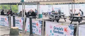  ??  ?? ‘Gracie’s Gardens’ area has been installed by the council on Packer Street to create a pedestrian­ised outdoor dining area.