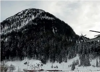  ?? PHOTO: AP ?? Marine One carrying US President Donald Trump arrives for the World Economic Forum in Davos.