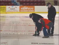  ?? COLIN MACLEAN/JOURNAL PIONEER ?? Crews were busy at Credit Union Place in Summerside, Monday, removing the curling ice from Eastlink Arena.