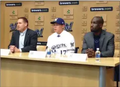  ?? Courtesy photo ?? Valencia High grad Keston Hiura, middle, fields questions from reporters at an introducto­ry press conference in Milwaukee on Wednesday.