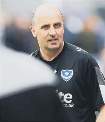  ??  ?? GLORY DAYS Paul Cook won the League Two title while Pompey boss in 2017