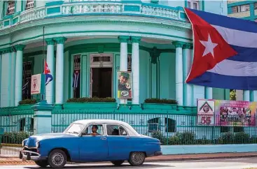  ?? Associated Press photos ?? Cuba is a hot tourism destinatio­n, but cuts in flights and uncertaint­y about American policy may change that.