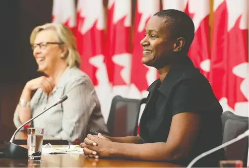  ?? SEAN KILPATRICK / THE CANADIAN PRESS ?? New Green Party Leader Annamie Paul, right, offers her insight alongside Green government house leader Elizabeth May on Monday..