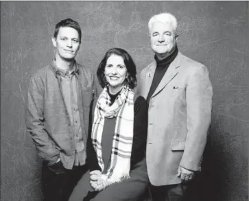  ?? Jay L. Clendenin
Los Angeles Times ?? BRIAN OAKES, left, director of “Jim,” is shown with the late journalist’s parents, Diane and John Foley.