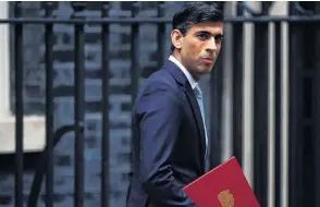  ?? PHOTO: REUTERS ?? Cash splash . . . Chancellor of the Exchequer Rishi Sunak last week announced the UK Government would introduce a discount throughout August for sitdown meals at pubs and restaurant­s to help pump money back into the struggling high street.