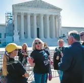  ?? KENT NISHIMURA/GETTY ?? Ashli Babbitt’s mom, Micki Witthoeft, center, joins others backing Jan. 6 defendants Tuesday in D.C.