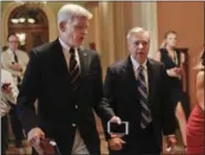  ?? ASSOCIATED PRESS FILE ?? Sen. Bill Cassidy, R-La., left, and Sen. Lindsey Graham, R-S.C., right, talk while walking to a meeting on Capitol Hill in Washington.