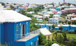  ??  ?? Dazzling: Bermuda’s roofs are terraced and painted white to collect clean and drinkable rain water