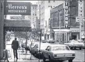  ?? BILLY DOWNS/ AJC FILE ?? Herren’s Restaurant on Luckie Street is noted as the first Atlanta restaurant to desegregat­e voluntaril­y in 1963. The Atlanta landmark closed in 1987.