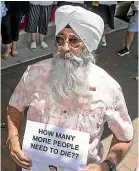  ?? JOHN COWPLAND/STUFF ?? Dairy owner Jarnail Singh protests in Hawke’s Bay.