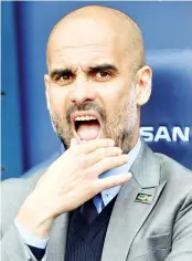  ?? - AFP photo ?? This file photo taken on May 16, 2017 shows Manchester City’s Spanish manager Pep Guardiola waits for kick off of the English Premier League football match between Manchester City and West Bromwich Albion at the Etihad Stadium in Manchester, north west...