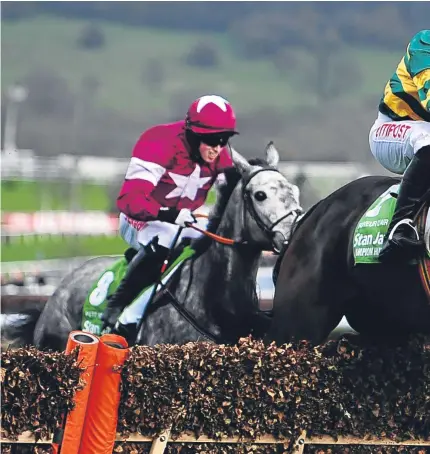  ?? Getty. ?? Buveur D’Air, ridden by Noel Fehily, jumps the last on the way to Champion Hurdle victory.