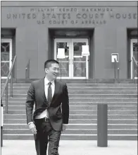  ?? AP/ TED S. WARREN ?? Hawaii Attorney General Doug Chin arrives to talk to reporters Monday outside a federal courthouse in Seattle.