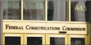  ?? Andrew Harnik / Associated Press file photo ?? The entrance to the Federal Communicat­ions Commission building in Washington.