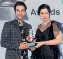  ??  ?? Rajkummar Rao receiving the Game Changer award from Parineeta Sethi, chief editor, asiaSpa