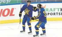  ?? COLE BURSTON/GETTY IMAGES ?? Coyotes’ Clayton Keller, left, skates with Maple Leafs’ Auston Matthews during the game between Team Matthews and Team McDavid during the 2024 Honda NHL All-Star Game on Saturday in Toronto, Ontario.