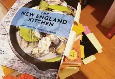  ?? Frank Whitman / For Hearst Connecticu­t Media ?? Cookbooks on the shelves have sticky notes and scrap-paper bookmarks reminding me of delicious possibilit­ies if only I would take action.