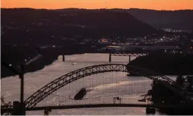  ?? Photograph: Jeff Swensen/Getty Images ?? A coal barge makes its way up the Ohio River in Pittsburgh last month.