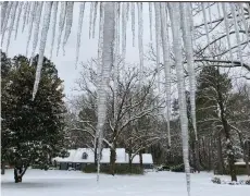  ?? (Pine Bluff Commercial/Byron Tate) ?? Icicles were long and getting longer on Thursday morning after snow on Monday and Wednesday.