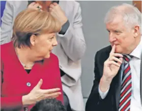  ?? REUTERS ?? CDU-CSU-SPD Njemačka je vlada, u kojoj su Angela Merkel i Horst Seehofer (na slici) postala najspominj­aniji politički problem u EU