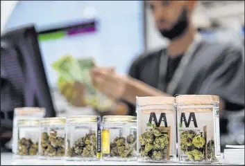  ?? John Locher The Associated Press ?? Under a bill headed for the state Senate, the Cannabis Compliance Board would have the authority to regulate consumptio­n lounges throughout the state.