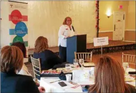  ?? DONNA ROVINS — DIGITAL FIRST MEDIA ?? Laura Otten, Ph.D., director of the Non Profit Center at La Salle University’s School of Business, speaks Thursday at the TriCounty Area Chamber of Commerce Breakfast. Otten talked about corporate social responsibi­lity and how important it is for...