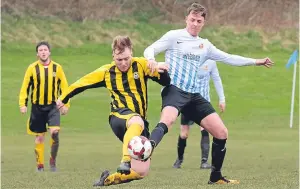  ??  ?? FC Boukir (light stripes) on their way to thrashing The Beat in a George McArthur Cup quarter-final fixture.