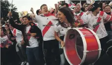  ?? Reuters ?? River Plate fans making a noise in Madrid ahead of the Copa Libertador­es clash with Boca Juniors