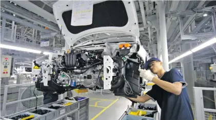  ?? ?? The production of new cars will be hit hard as Ukraine-related production shuts down and supply chains take a hammering. Photo: Yonhap/EPA