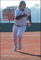  ?? Daniel Bereznicki/McDonald County Press ?? Kreighton Kasischke (No. 23) sprints and makes it to third base.