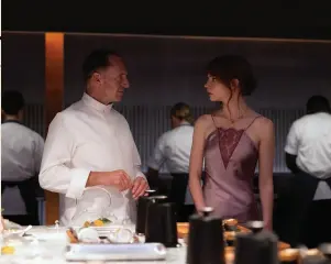  ?? ?? Ralph Fiennes and Anya Taylor-Joy in Searchligh­t’s The Menu.