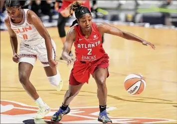  ?? Sarah Gordon / Associated Press ?? Aari Mcdonald, right, seen last week, helped Atlanta snap a four-game skid with 15 points and a game-clinching basket. The Dream have already matched their win total from 2021.