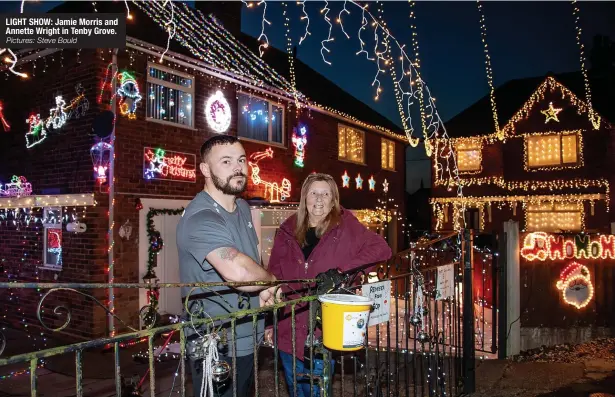  ?? Pictures: Steve Bould ?? LIGHT SHOW: Jamie Morris and Annette Wright in Tenby Grove.