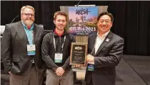  ?? CONTRIBUTE­D ?? The Miami Valley Regional Planning Commission won a URISA award for their tornado recovery work. From left are Tom Harner, MVRPC GIS manager; Milo Simpson, MVRPC Planner II and Martin Kim, MVRPC Director of Community & Regional Planning.