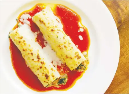  ?? LUIS VALDIZON ?? Florentine cannelloni, created by Umberto Menghi of Giardino Restaurant, matches well with an acidic white wine, such as Chardonnay or Sauvignon Blanc.