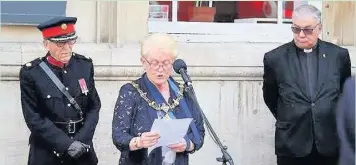  ??  ?? A flag raising ceremony, to mark the start of Armed Forces Week, took place outside of Loughborou­gh Town Hall on Monday (June 19). Pictured is Mayor of Charnwood, Coun Pauline Ranson (centre), speaking at the ceremony.
