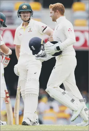  ?? PICTURE: JAMES O’BRIEN/PA ?? CROSSED PATHS: Cameron Bancroft and Jonny Bairstow, right, pictured during day five at The Gabba. But it is an earlier meeting in Perth between the two that is dominating the headlines.