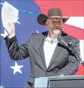  ?? Sarah Miller Idaho Statesman ?? Ammon Bundy is accused by St. Luke’s of hiding assets and engaging in “sham” transactio­ns to avoid paying damages after losing a defamation case.