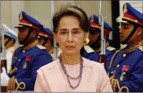  ?? (AP/Heng Sinith) ?? Burma’s State Counselor Aung San Suu Kyi reviews an honor guard on April 30, 2019, at the Peace Palace in Phnom Penh, Cambodia.