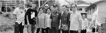  ??  ?? Gerawat (front, third right) with the villagers of Long Lamai in a group photo.