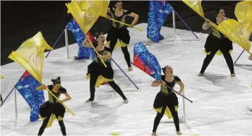  ?? MARSHALL GORBY\STAFF ?? Liverpool High School from Liverpool, N.Y., competed in a previous edition of the WGI Color Guard World Championsh­ips held at the Wright State University Nutter Center.