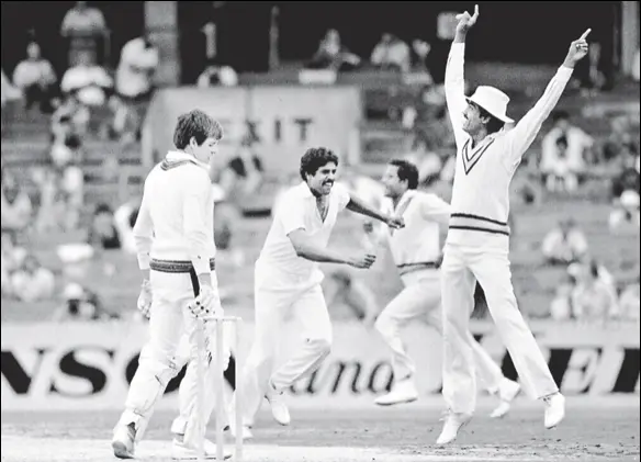  ?? GETTY ?? India celebrate as Kapil Dev’s sensationa­l spell, braving injury, takes the visitors to a famous win over Australia at MCG in 1981. Set 143 to win, Australia were bundled out for 83, losing by 59 runs.