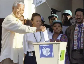  ?? JOHN PARKIN AP ?? NELSON Mandela casts his vote at Ohlange High School hall in Inanda, north of Durban, on April 27, 1994. |