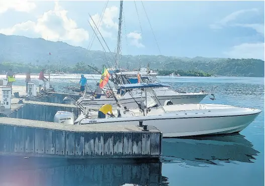  ?? PHOTO BY GARETH DAVIS ?? Three of the seven boats that participat­ed in the low-key Superstars of Port Antonio Blue Marlin Tournament from October 13-15.